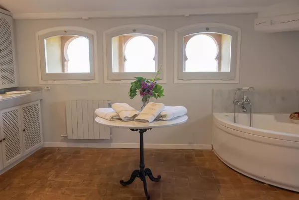 The Sultan suite has a large bathroom with a jacuzzi.